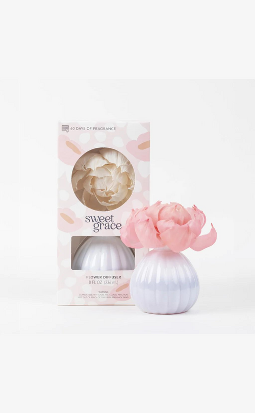 Sweet Grace flower diffuser with a pink bloom, white vase, and matching gift box.