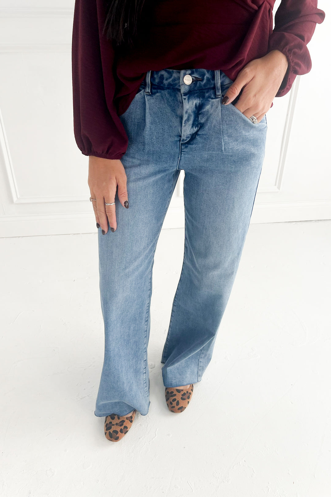 Risen High Rise Wide Leg Jeans With Pleats