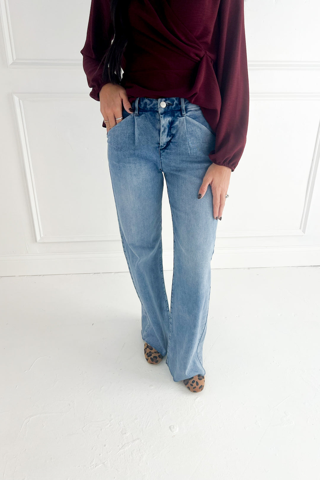 Risen High Rise Wide Leg Jeans With Pleats