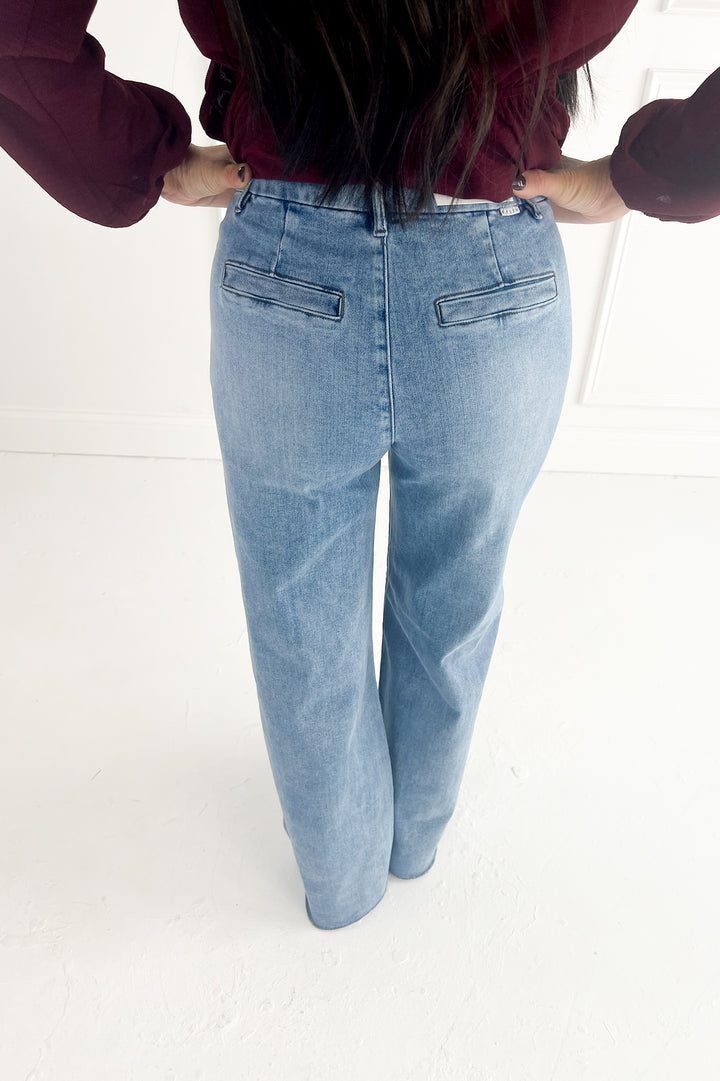 Risen High Rise Wide Leg Jeans With Pleats