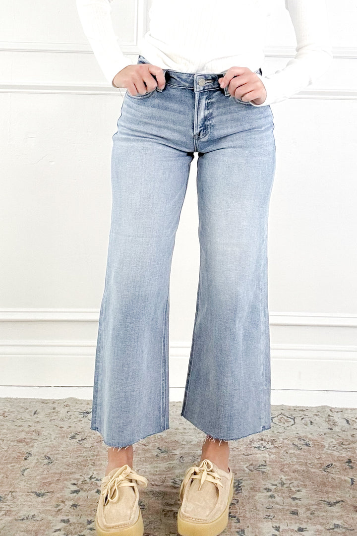 Risen Mid Rise Crop Wide Raw Cut Hem Jeans