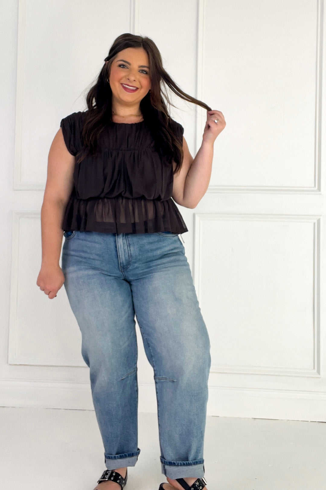 Semi Sheer Sleeveless Shirred Peplum Top