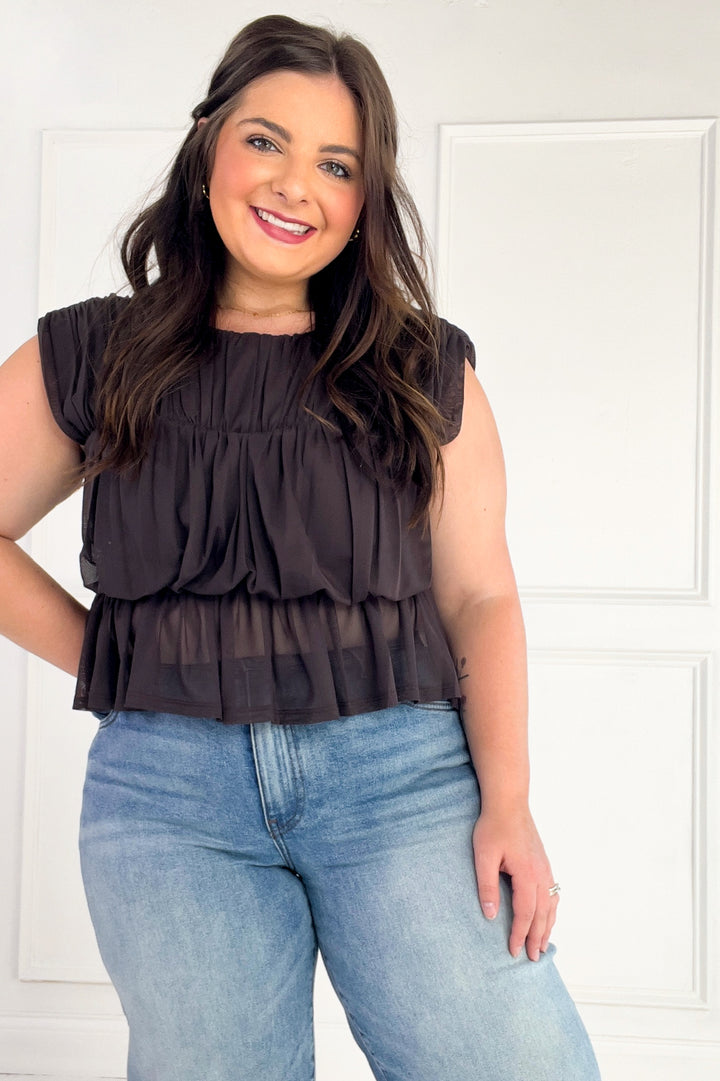 Semi Sheer Sleeveless Shirred Peplum Top