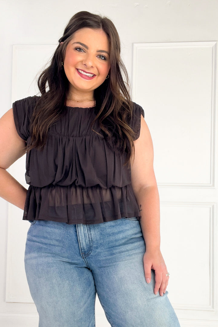Semi Sheer Sleeveless Shirred Peplum Top