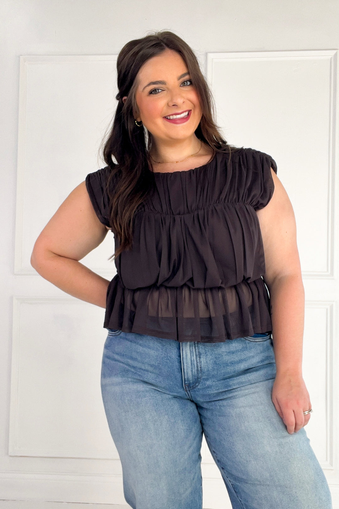 Semi Sheer Sleeveless Shirred Peplum Top