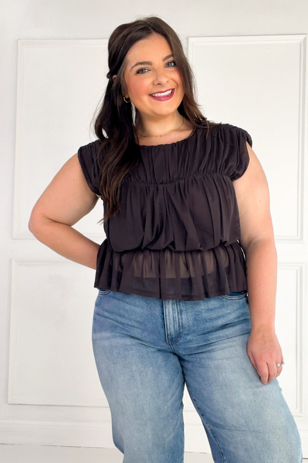 Semi Sheer Sleeveless Shirred Peplum Top