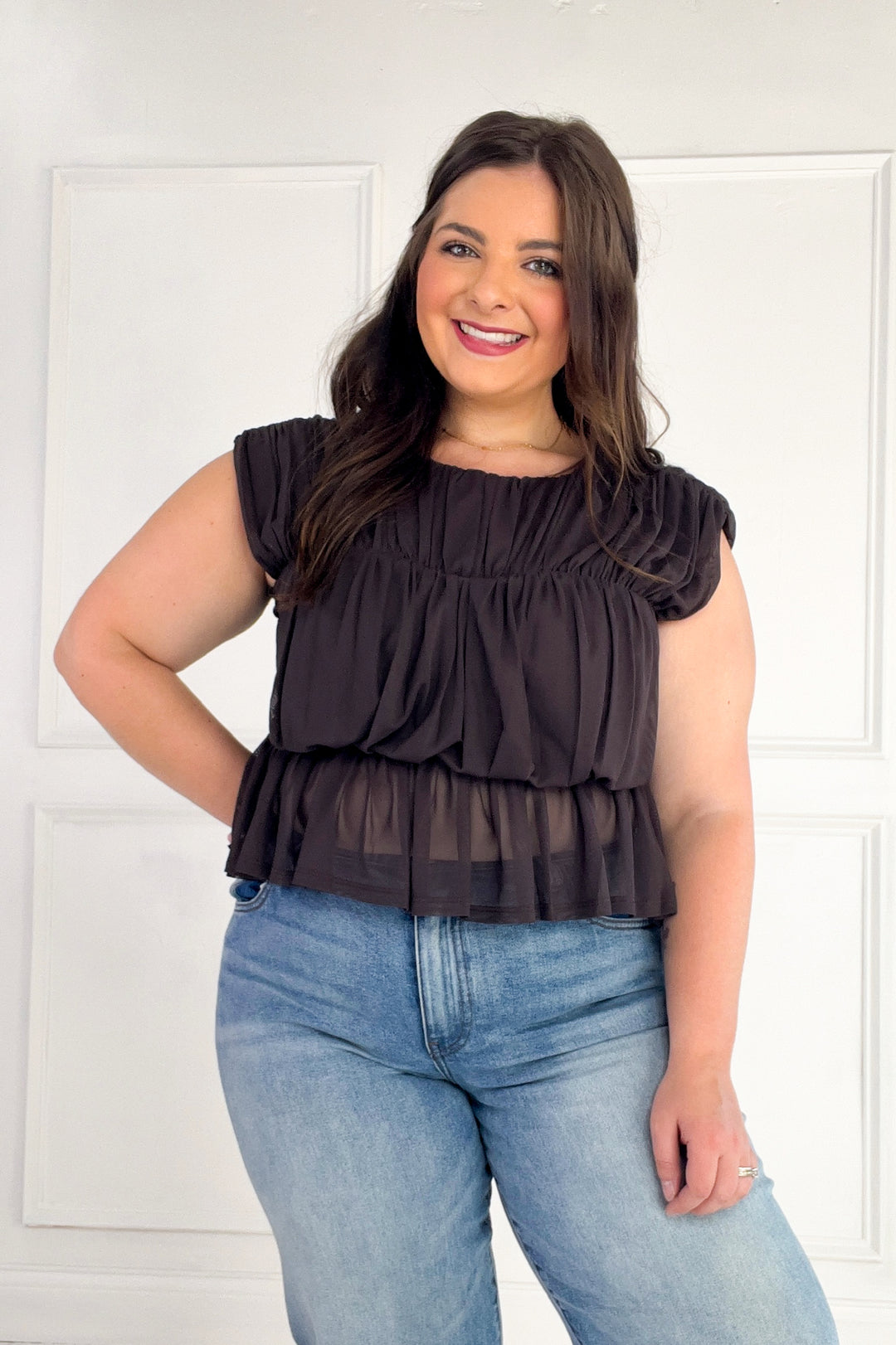 Semi Sheer Sleeveless Shirred Peplum Top
