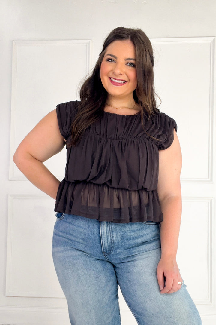 Semi Sheer Sleeveless Shirred Peplum Top