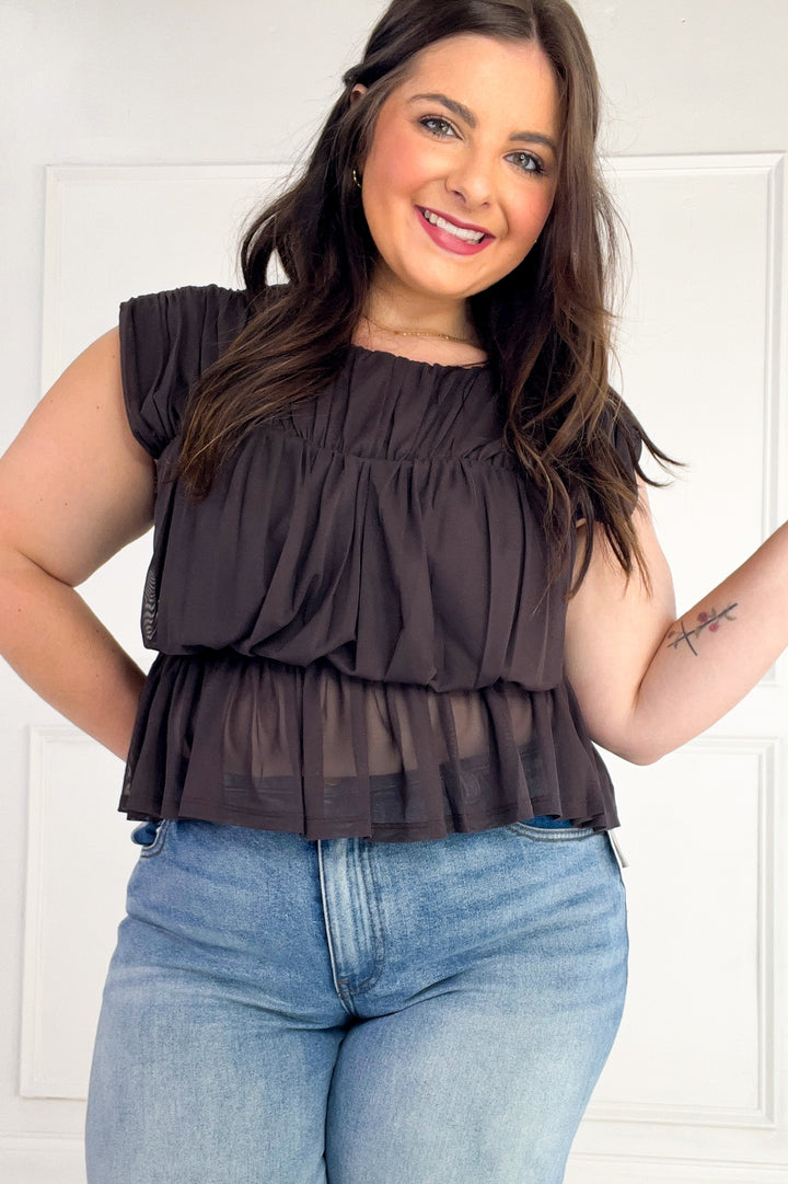 Semi Sheer Sleeveless Shirred Peplum Top