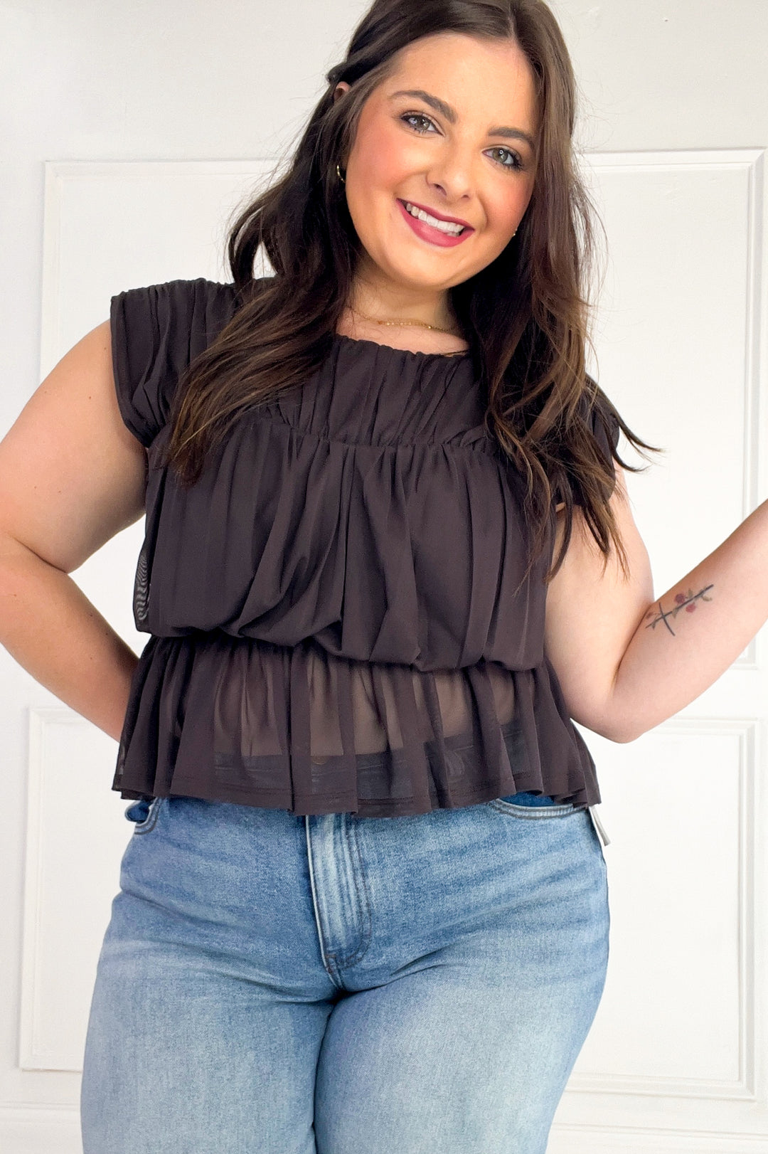 Semi Sheer Sleeveless Shirred Peplum Top