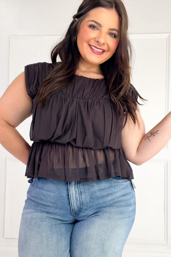 Semi Sheer Sleeveless Shirred Peplum Top